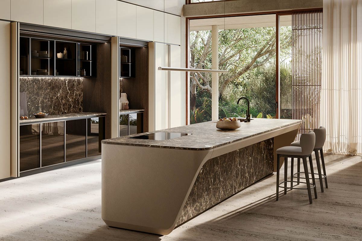 Layout cucina 2026 isole scultura, colonne monolitiche e spazi ibridi