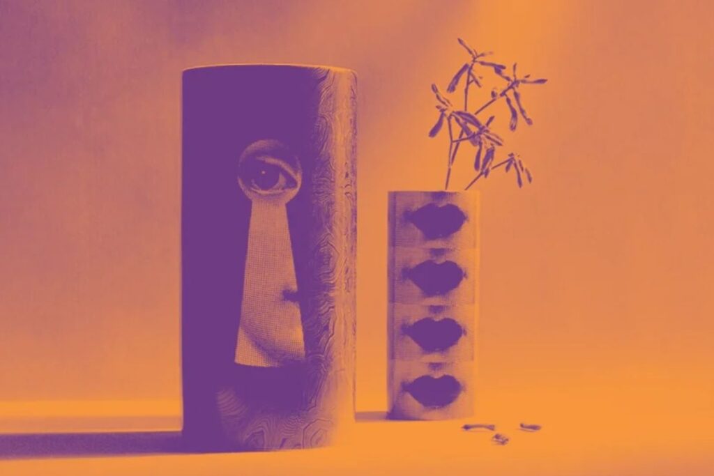 Fornasetti vases featuring Lina Cavalieri's face and cloud motifs