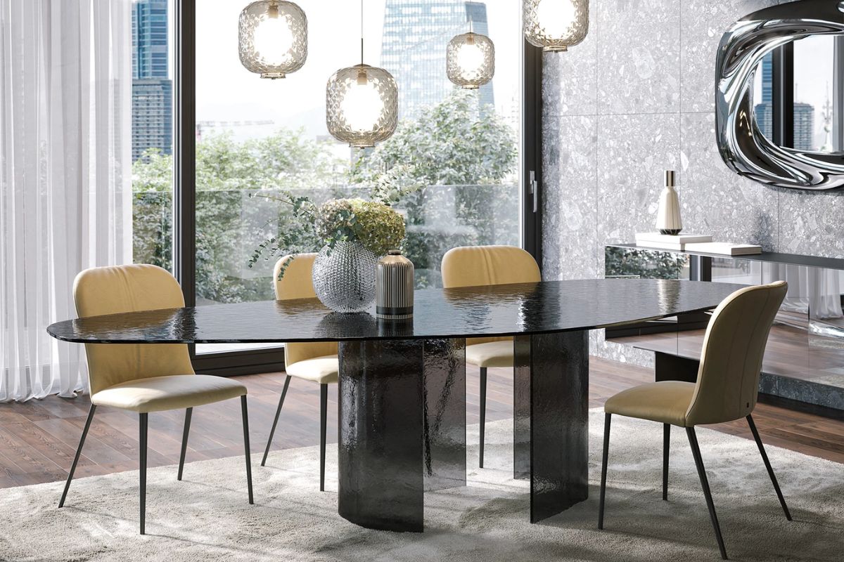 Tonin Casa, Ablos tavolo in vetro curvato che unisce materia, luce e leggerezza visiva