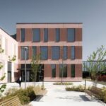 Edificio in mattoni con facciata scandita da finestre, progetto FTA Filippo Taidelli Architetto a Milano