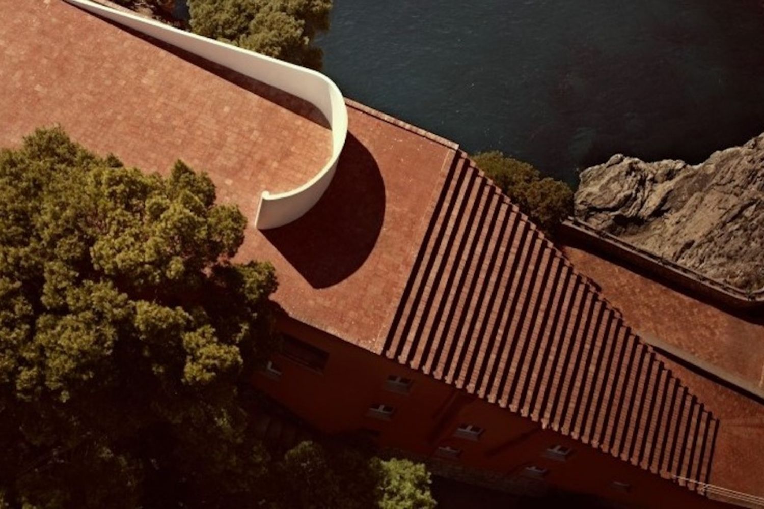 Overhead view of the trapezoidal staircase and roof terrace at Casa Malaparte in Capri