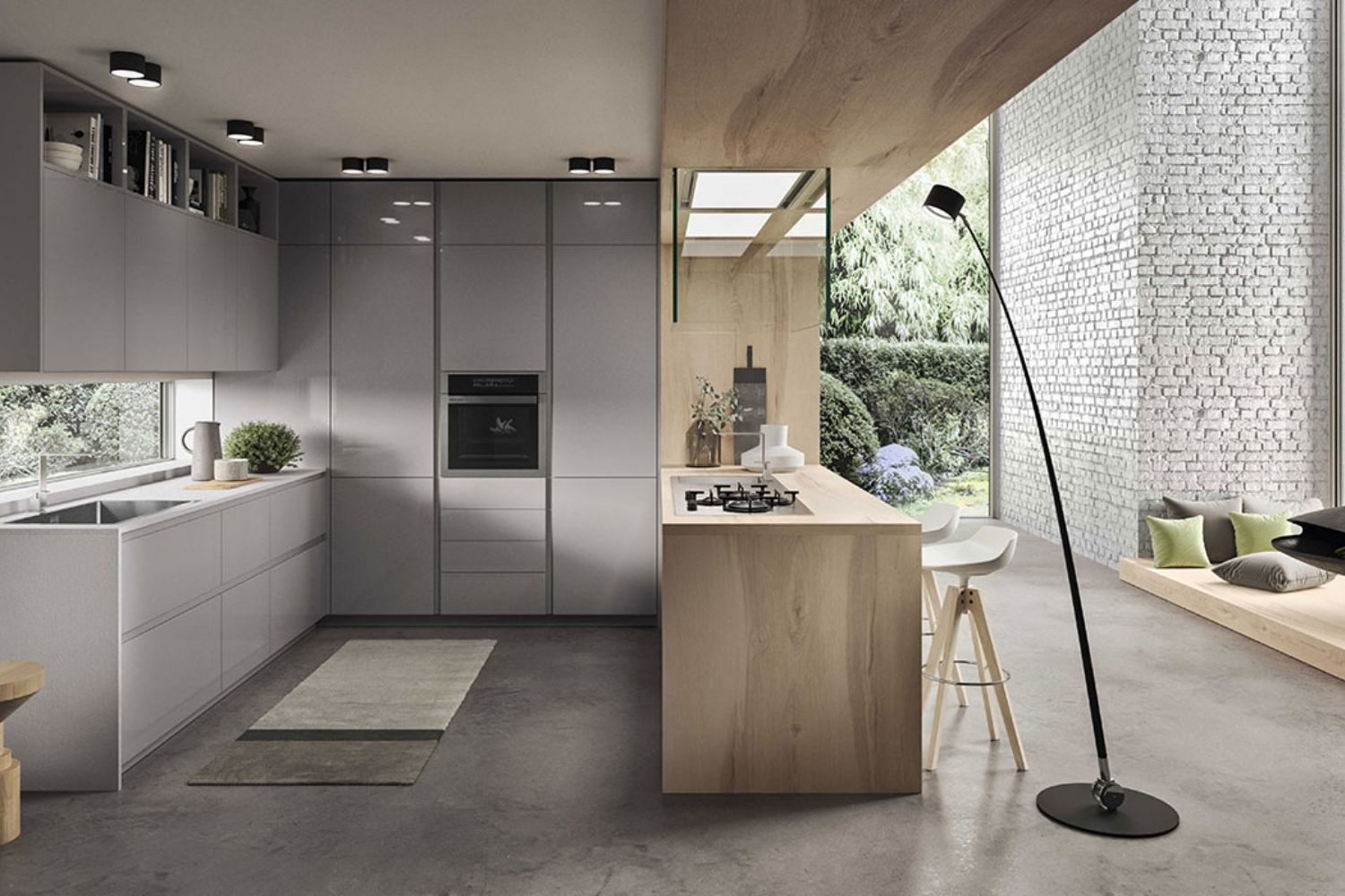 Cucina con penisola in un open space rettangolare
