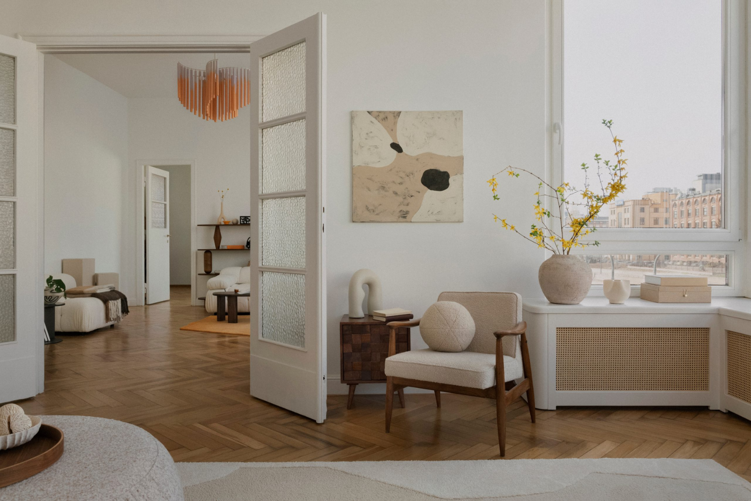 Organic Modern living room with natural materials, soft colours and sculptural furniture