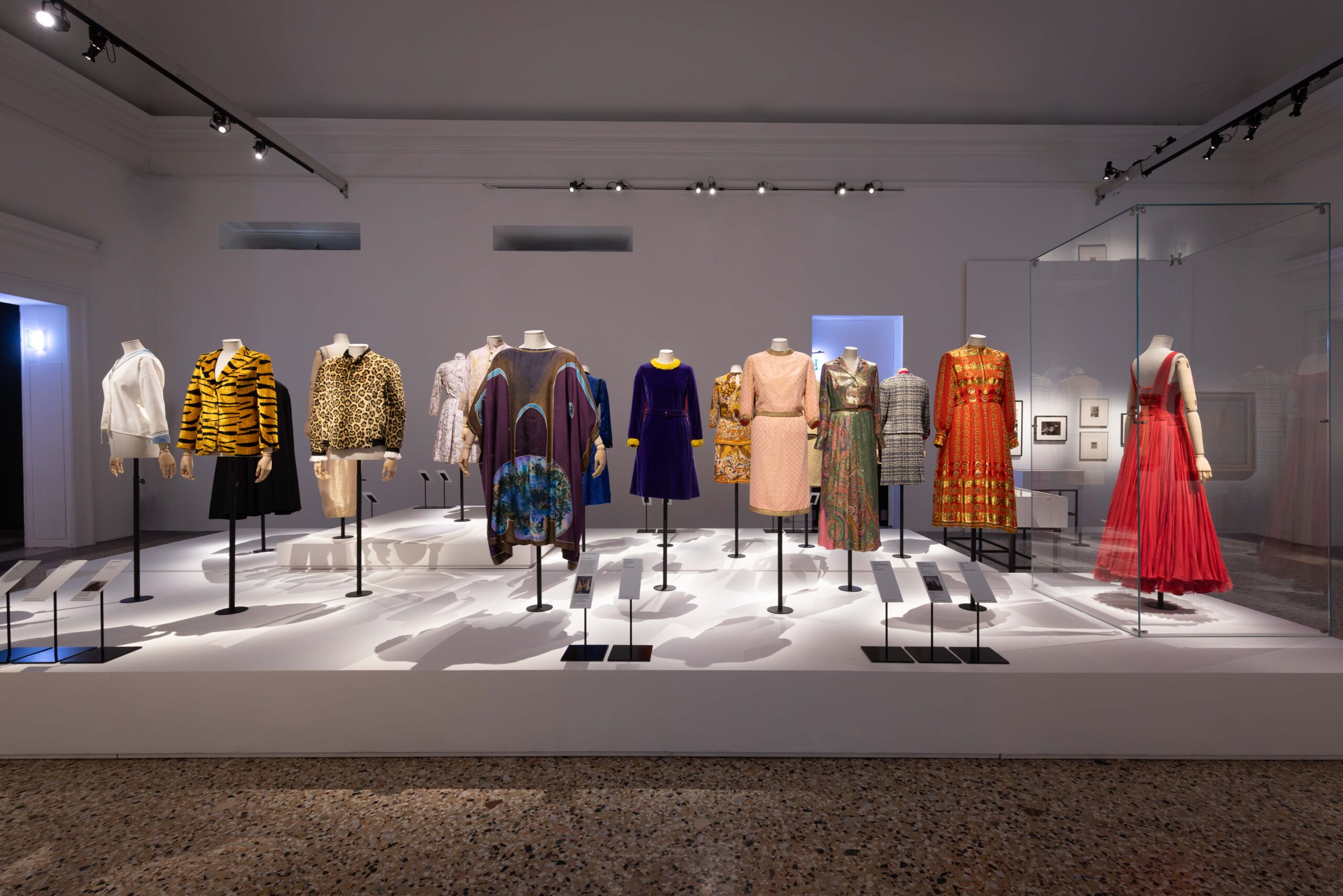 Garments on display at the Dalí e la Moda exhibition at Palazzo Reale in Milan with Novacolor surfaces