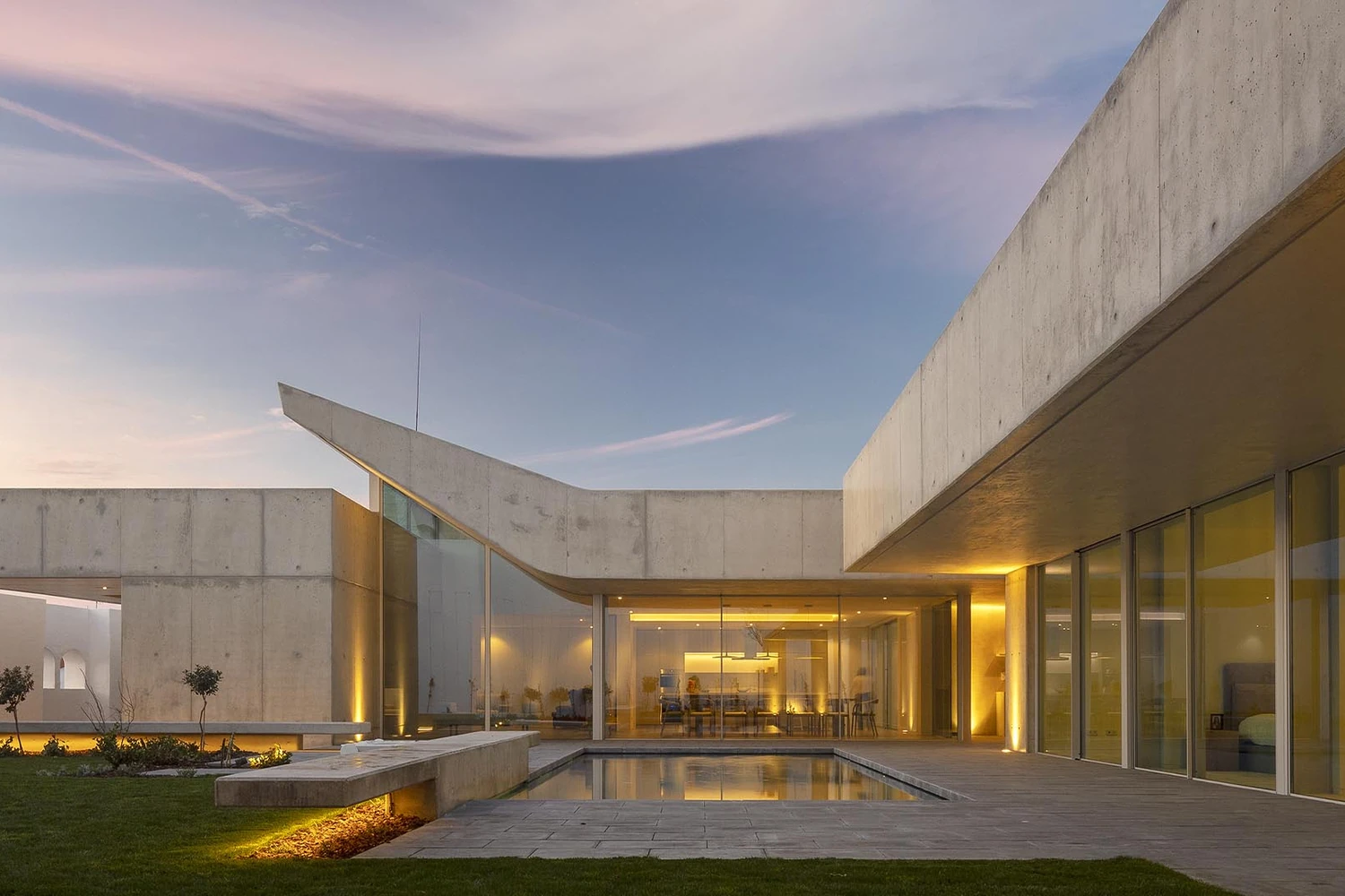 Contemporary villa with textured façades and large windows