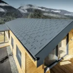 Timber building with a PREFA metal roof in a mountain setting