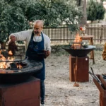 OFYR outdoor cooker being used in a furnished garden