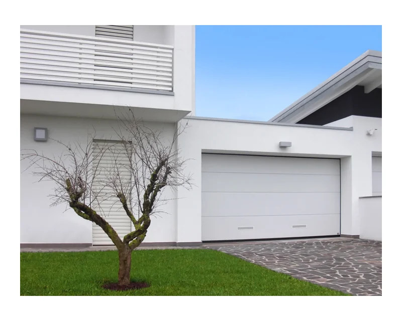 White Breda Persus sectional garage door with smooth panels