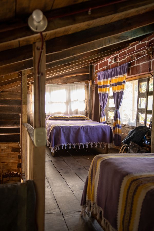 Comfortable attic bedroom beneath a sloping roof