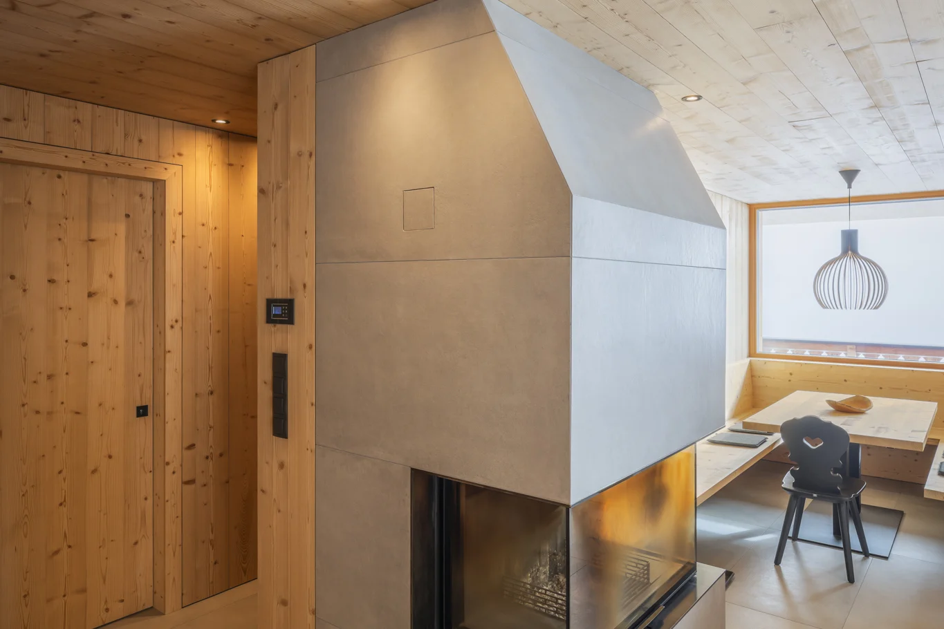 Timber house interior with exposed wooden walls and ceiling