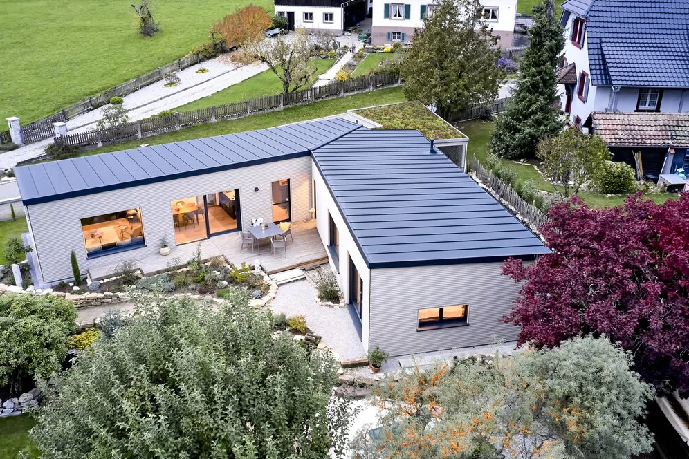 Energy efficient timber bungalow with a solar roof