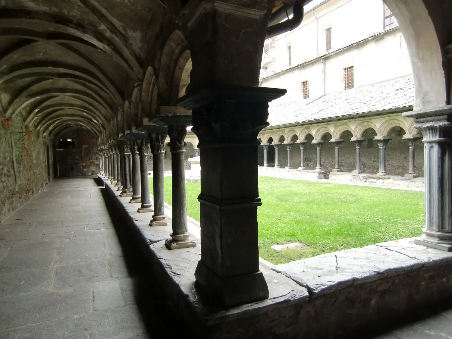 The Romanesque cloister of the Collegiate Church of Sant'Orso in Aosta with carved marble capitals