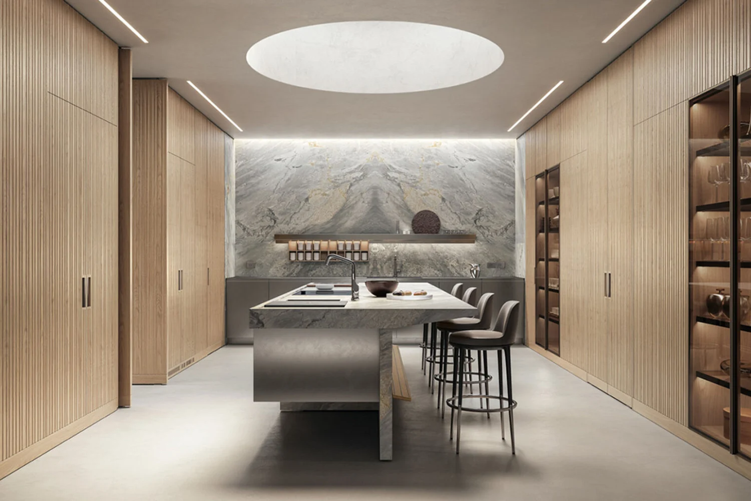 Kitchen with tall timber units, a veined marble splashback and a steel island beneath a circular skylight