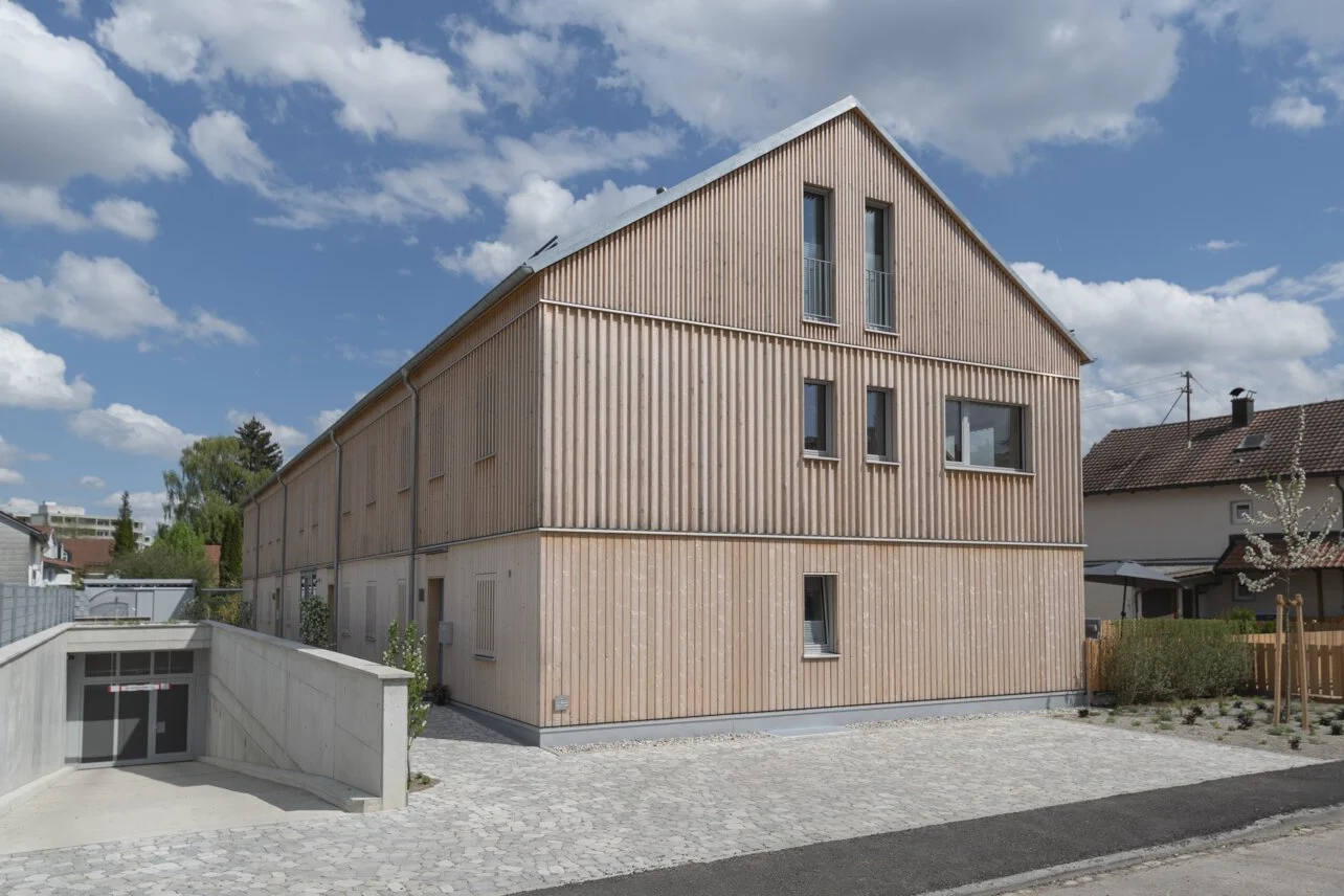 Multi family building with vertical timber cladding
