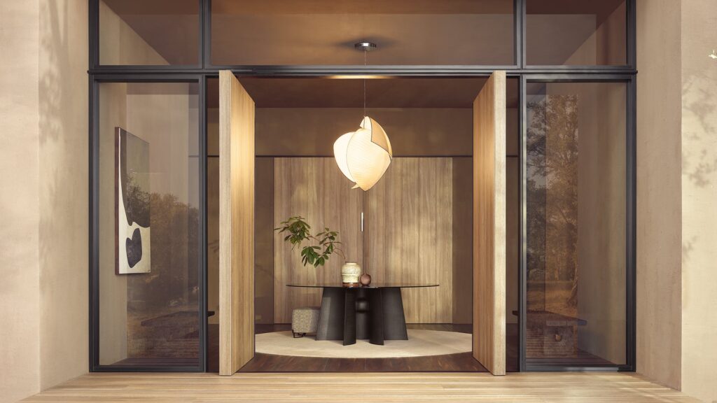 Sculptural pendant above a Poliform dining table