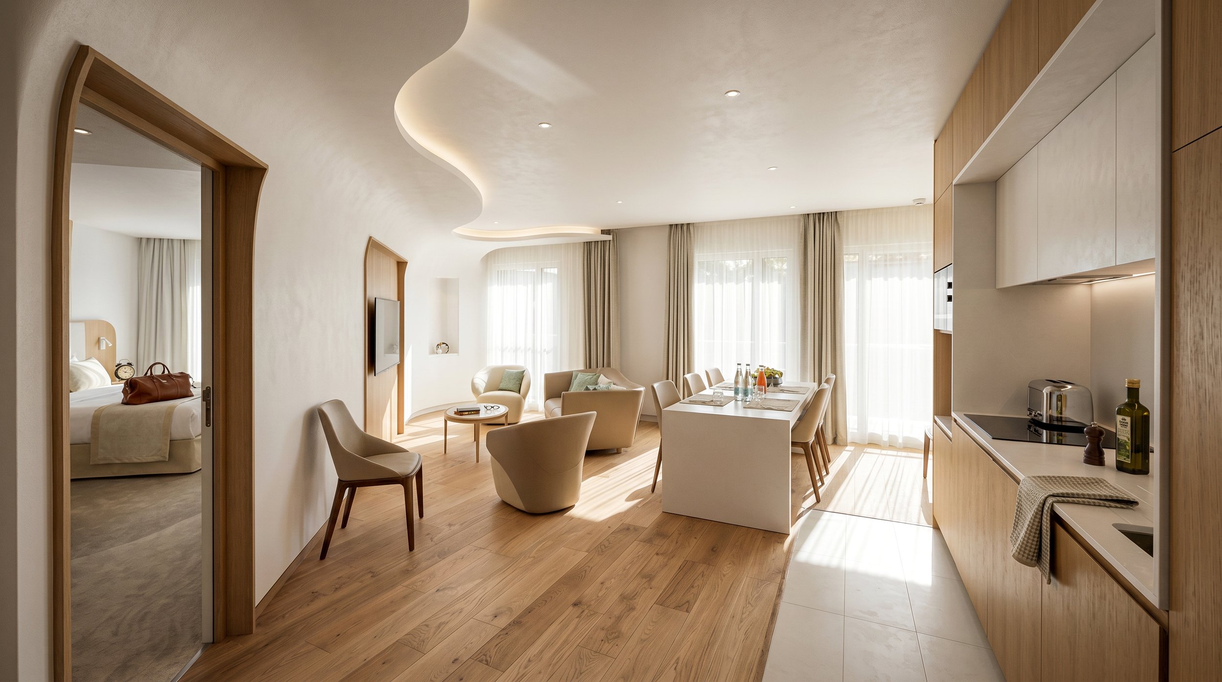 Suite del Miramar La Cigale con arredi Floema Pro, cucina in legno e zona soggiorno luminosa