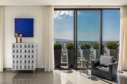 Fornasetti cabinet in the living room of Askdeco's Mallorca project