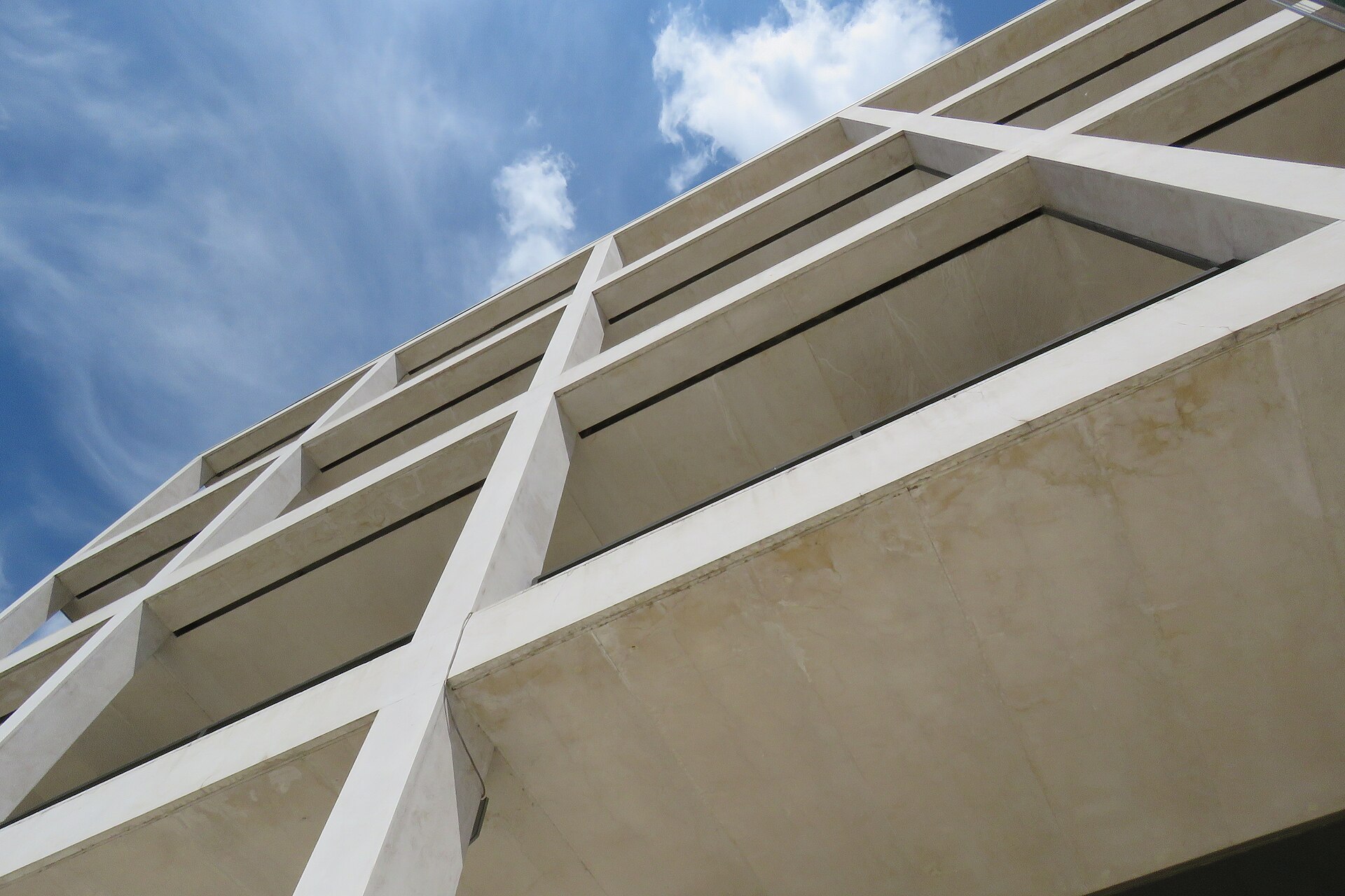 Detail of the facade grid and loggias at Giuseppe Terragni’s Casa del Fascio in Como
