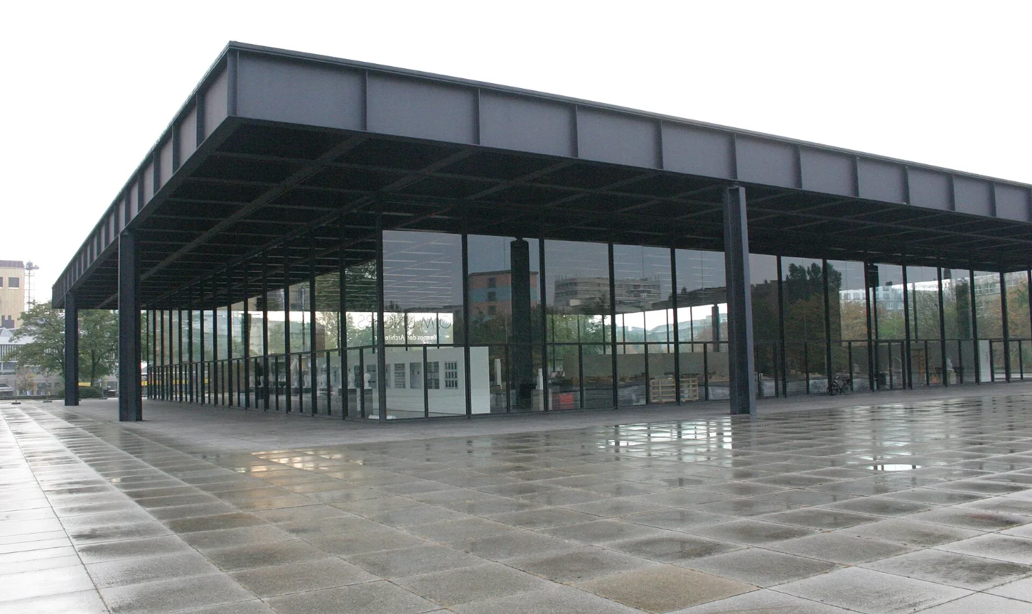 Mies van der Rohe's Neue Nationalgalerie in Berlin, glass hall beneath the steel roof