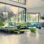Sedute basse modulari Roche Bobois davanti a grandi vetrate