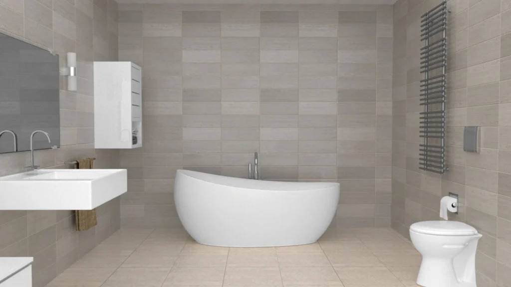 Bagno con vasca freestanding bianca, lavabo e rivestimenti grigi