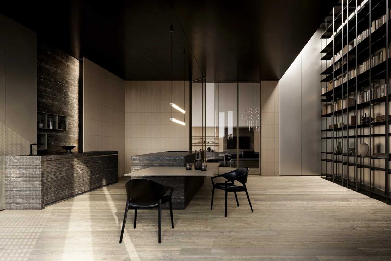 Dark travertine kitchen with dining table and full height bookcase in an open plan space