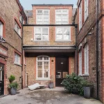 Brick façade of 10 Bowling Green Lane in London, the new home of the Zaha Hadid Foundation